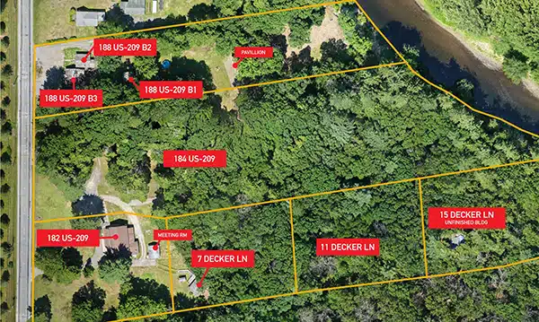 Complete drone map of the same 13-acre commercial property with property lines overlaid