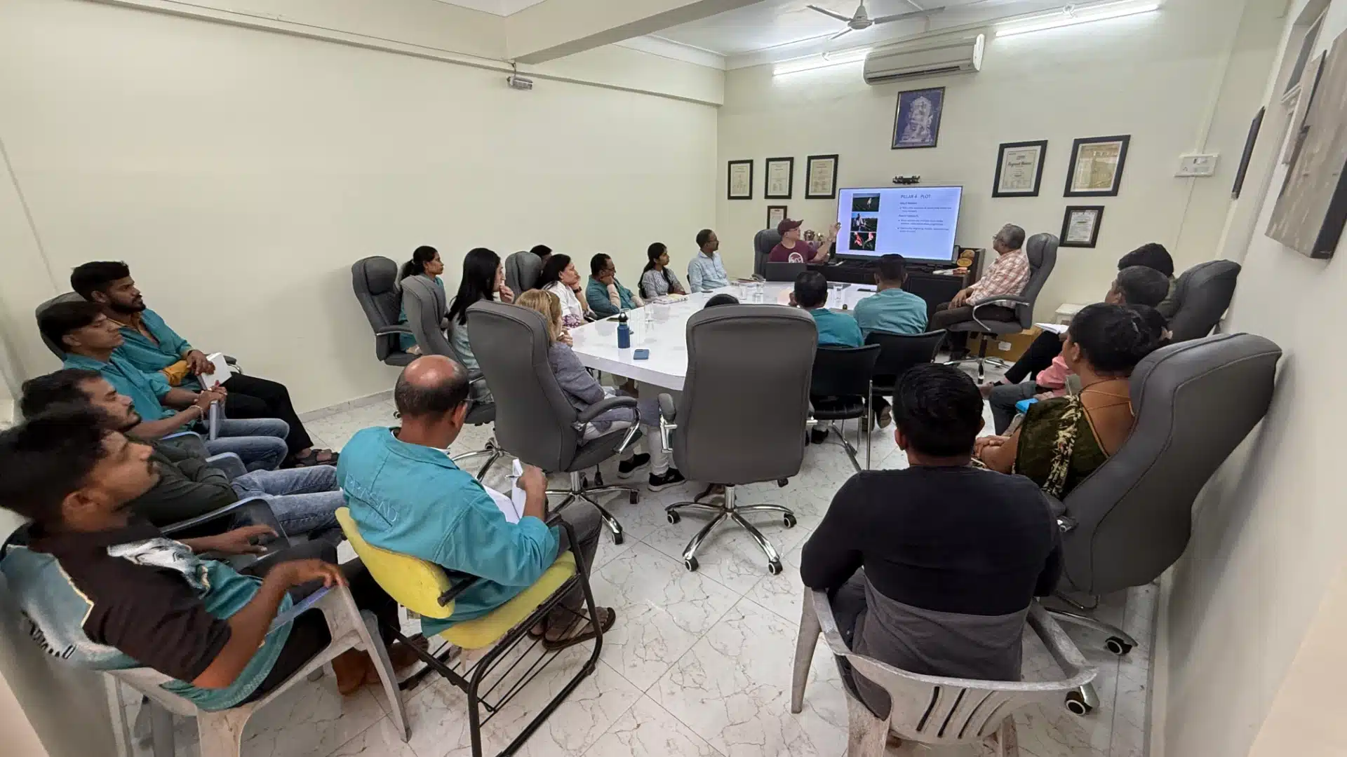 Nuby DeLeon teaching the first Stories That Move Mountains workshop to PRASAD staff and volunteers in Ganeshpuri, India